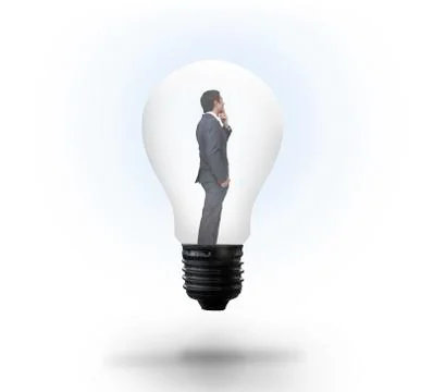 Thinking businessman in light bulb 스톡 일러스트