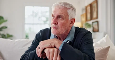 Thinking, cane and old man on home sofa with nostalgia, remember or relax in Stock Footage 337631008