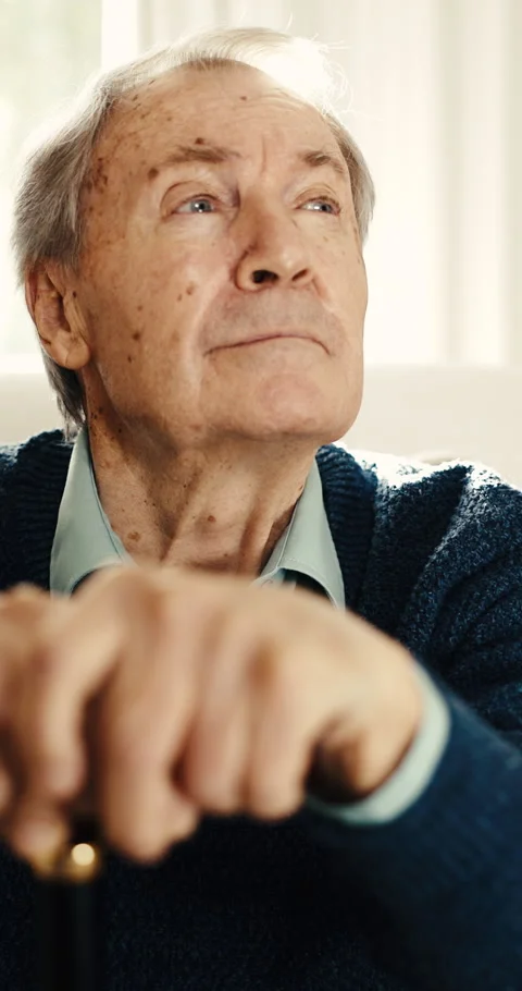Thinking, cane and senior man in home for reflection, nostalgia and memory in Stock Footage 342237739