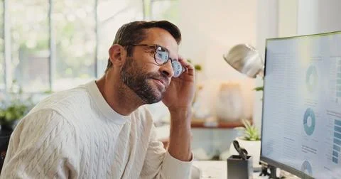 Thinking, charts and man on computer in home for review of graphs for report Stock Photos