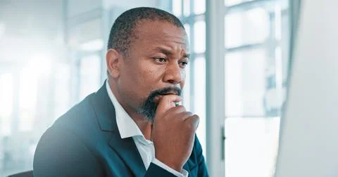 Thinking, computer and black man in office with business research, ideas and Stock Photos