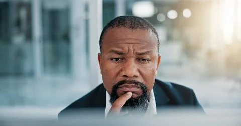 Thinking, computer and black man in office with research, online ideas and Stock Photos