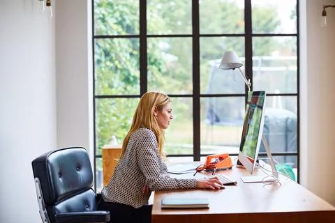 Thinking, computer and creative woman in office for research, project management Stock Photos
