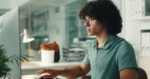 Thinking, computer and programming in office, man and IT specialist with glasses Stockbeeldmateriaal 294287577