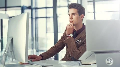 Thinking, computer and reading with business man in office for vision, legal Stock Photos
