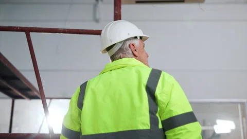 Thinking, construction and back of man in building for inspection, safety Stock Footage 341548145