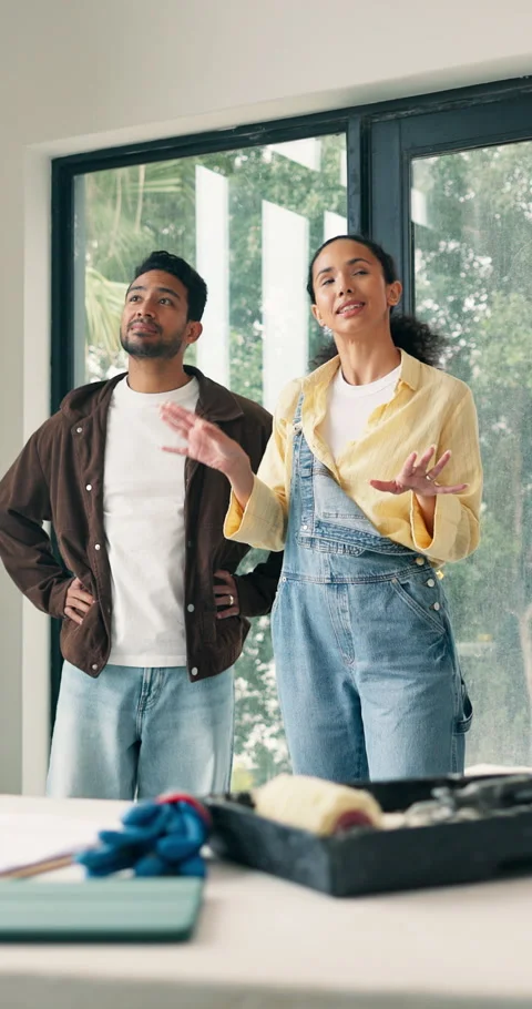 Thinking, couple and talking at house for renovation, planning and interior Stock Footage 340899961