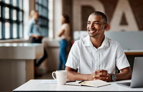 Thinking, creative and man in office with smile, vision and campaign ideas .. Stock Photos