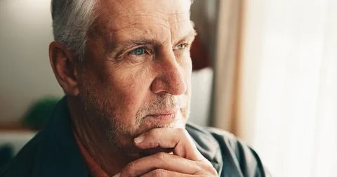 Thinking, decision and senior man by window in home with memory, remember o.. Stock Photos