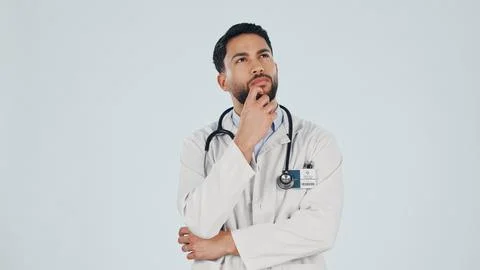 Thinking, doctor and man in studio, healthcare insight or vision on white b.. Stock Photos