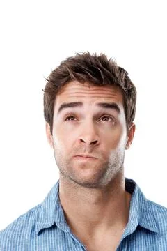 Thinking, doubt and man in studio for decision, choice and brainstorming for pro Stock Photos