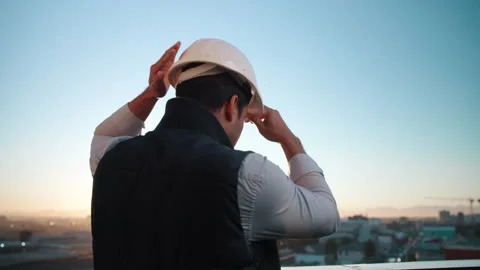 Thinking, engineer and helmet outdoor for construction, inspection or planning Stock Footage 337924063