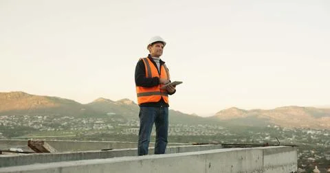 Thinking, engineer and man with tablet at construction site, building Stock Photos