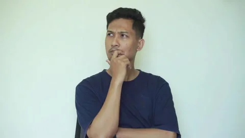 Thinking, face and asian man with decision on isolated Stock Footage 322116072