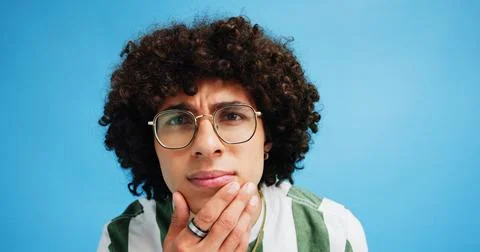 Thinking, face and man with glasses for brainstorming, problem solving or idea 스톡 사진