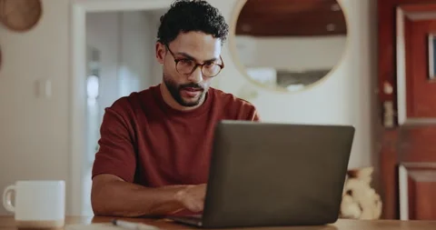 Thinking, freelancer and man with laptop, home and research for article, online Stock Footage 329406333