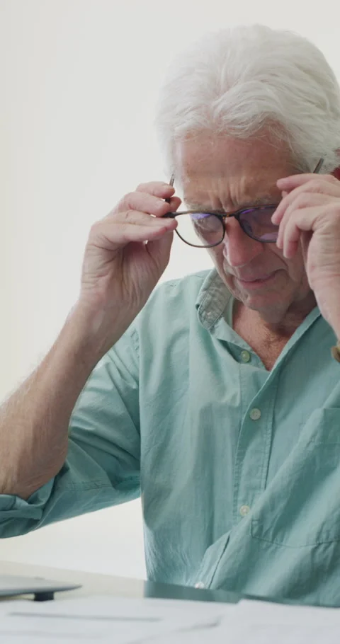 Thinking, glasses and old man with stress for paperwork, financial anxiety and Stock Footage 335109834