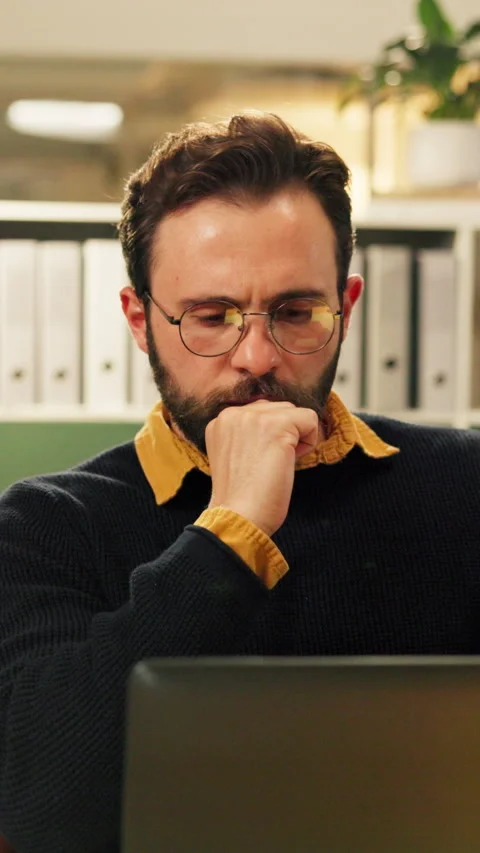 Thinking, glasses or man in agency with laptop, problem solving or budget Stock Footage 335354935