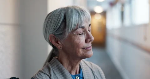 Thinking, happy or elderly woman in center with insight, daydream or nostalgia Stock Footage 340744188