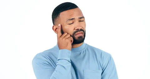 Thinking, idea and man in doubt with confusion in memory isolated on white Stock Footage 250090449