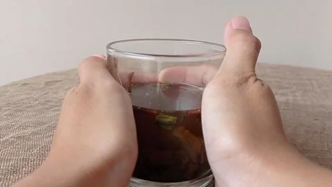 Thinking of idea while drinking a cup of tea Stock Footage 145629886
