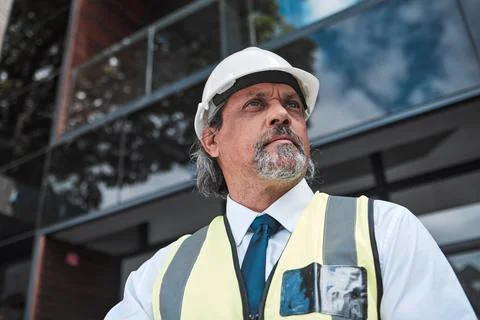 Thinking, ideas and engineering man at outdoor building, construction site and Fotos de archivo