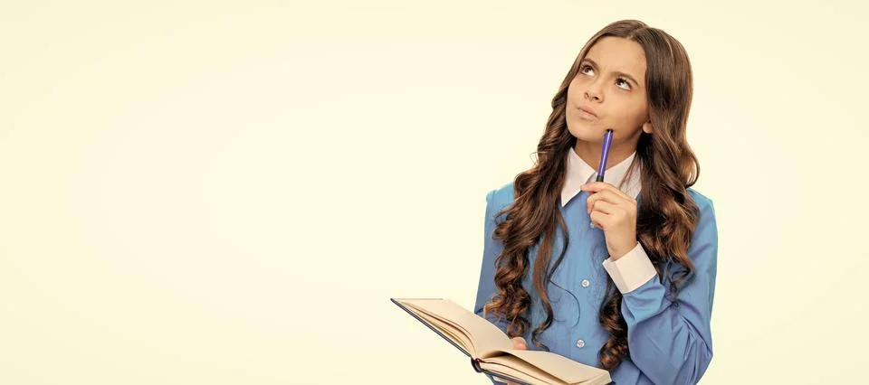 Thinking kid solve mathematical problem holding school book isolated on white Stock Photos