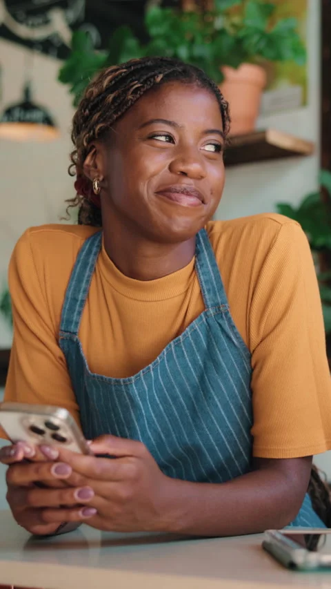 Thinking, laugh and barista in cafe with phone, chat response and funny memory Stock Footage 342244638