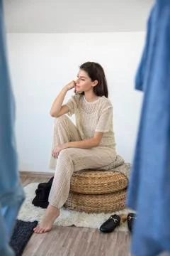 Thinking to make some wardrobe changes. Stock Photos