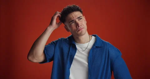 Thinking, man and confused with question in studio for doubt, uncertain and Stock Footage 314037313