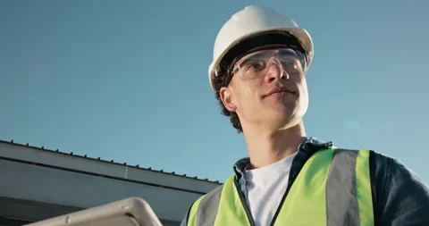 Thinking, man and construction worker with tablet on site with research for Stock Footage 343512265