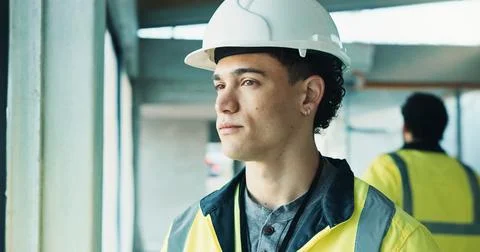 Thinking, man and construction worker on site with planning, memory or ideas for Stock Photos