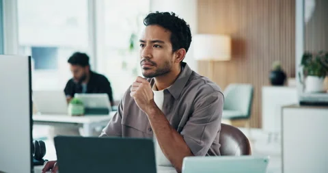 Thinking, man and creative with computer, office or reporter with ideas for Stock Footage 329373915