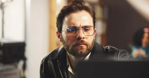 Thinking, man and editor in studio for editing with post production, process or Stock Photos