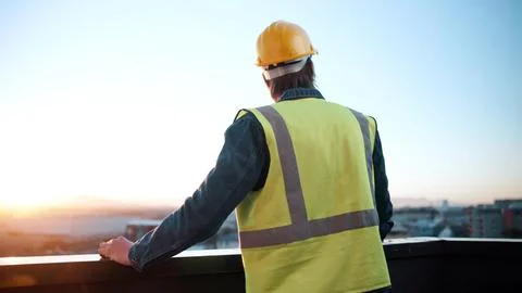 Thinking, man and engineer on balcony for construction, inspection and idea.. Foto stock