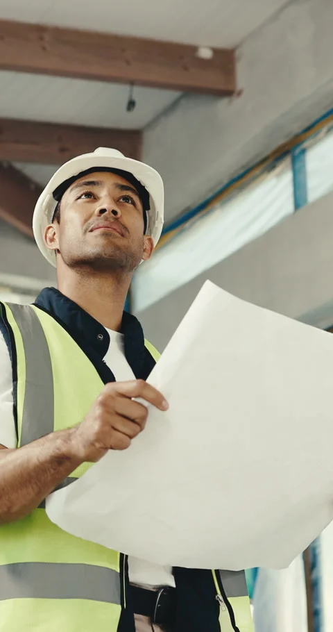 Thinking, man and engineer with document for construction, blueprint and Stock Footage 345551178