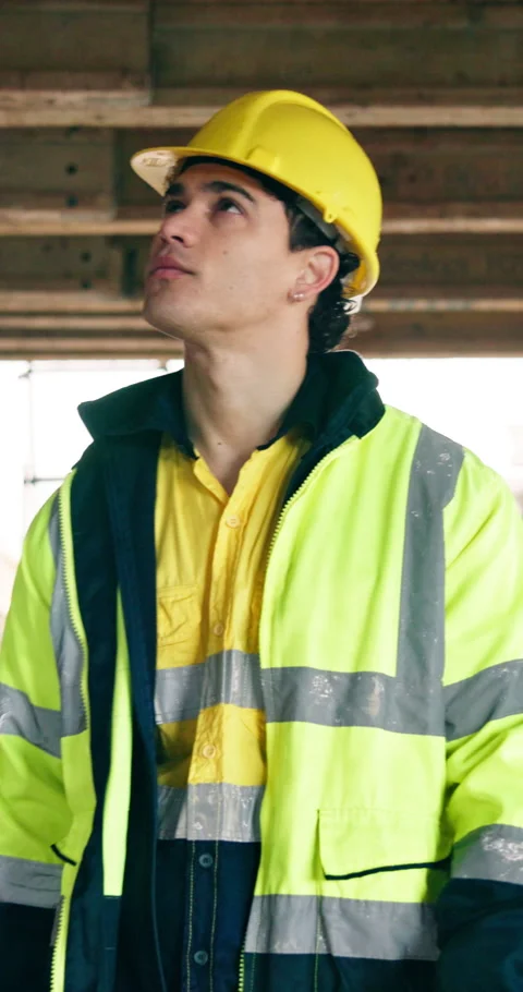 Thinking, man and engineer with helmet for construction, safety and inspection Stock Footage 340874405