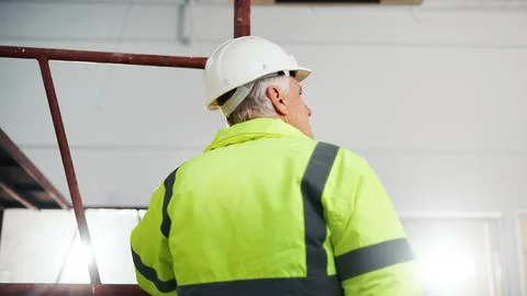 Thinking, man and engineer with helmet for construction, protection and ideas Stock Photos
