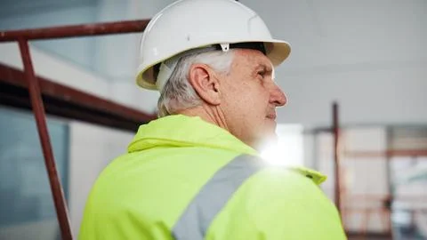 Thinking, man and engineer at site with helmet, protection and inspection for Stock Photos