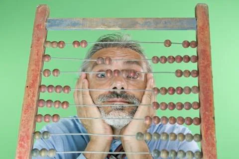 Thinking Man and  Old Abacus Stock Photos
