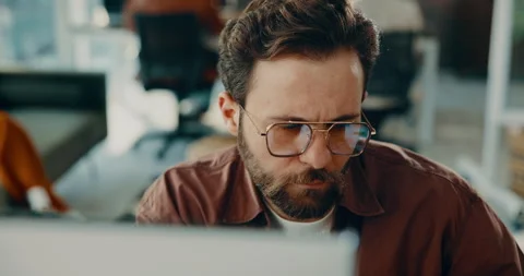 Thinking, man and reading on computer in office for research, review article or Stock Footage 316172301