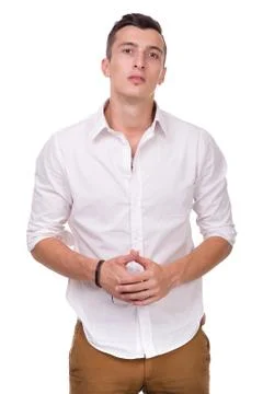 Thinking man isolated on white background. Closeup portrait of a casual young Stock-Fotos