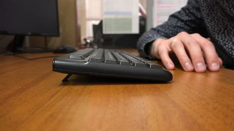 Thinking, a man knocks his fingers on the table Stock Footage 111538848
