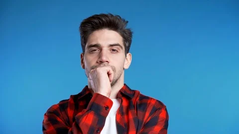 Thinking man looking up around on blue.worried contemplative face expressions Stock Footage 120460679