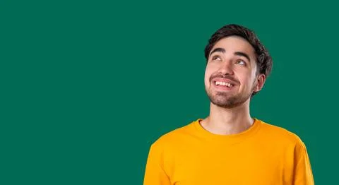 Thinking Man Looking Up, Searching Opportunity On Green Background. Curious Stock Photos