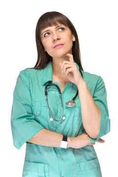 Thinking medical doctor woman looking up Stock Photos