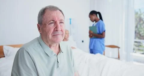 Thinking, old man and visitor in bedroom at hospital, recovery and patient with Stock Photos