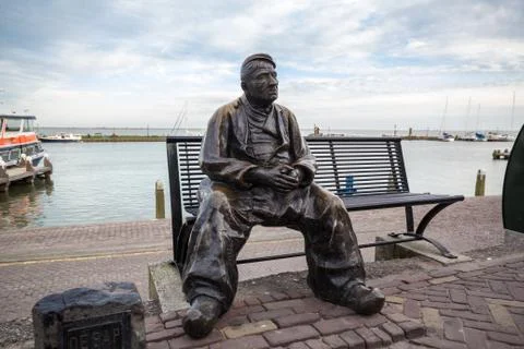 Thinking old man on the bench Stock Photos