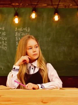 Thinking over problem. schoolgirl thinking over problem. thinking over problem Foto stock