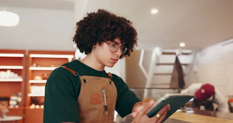 Thinking, owner and man at restaurant with tablet, menu development and planning Stock Footage 318337527
